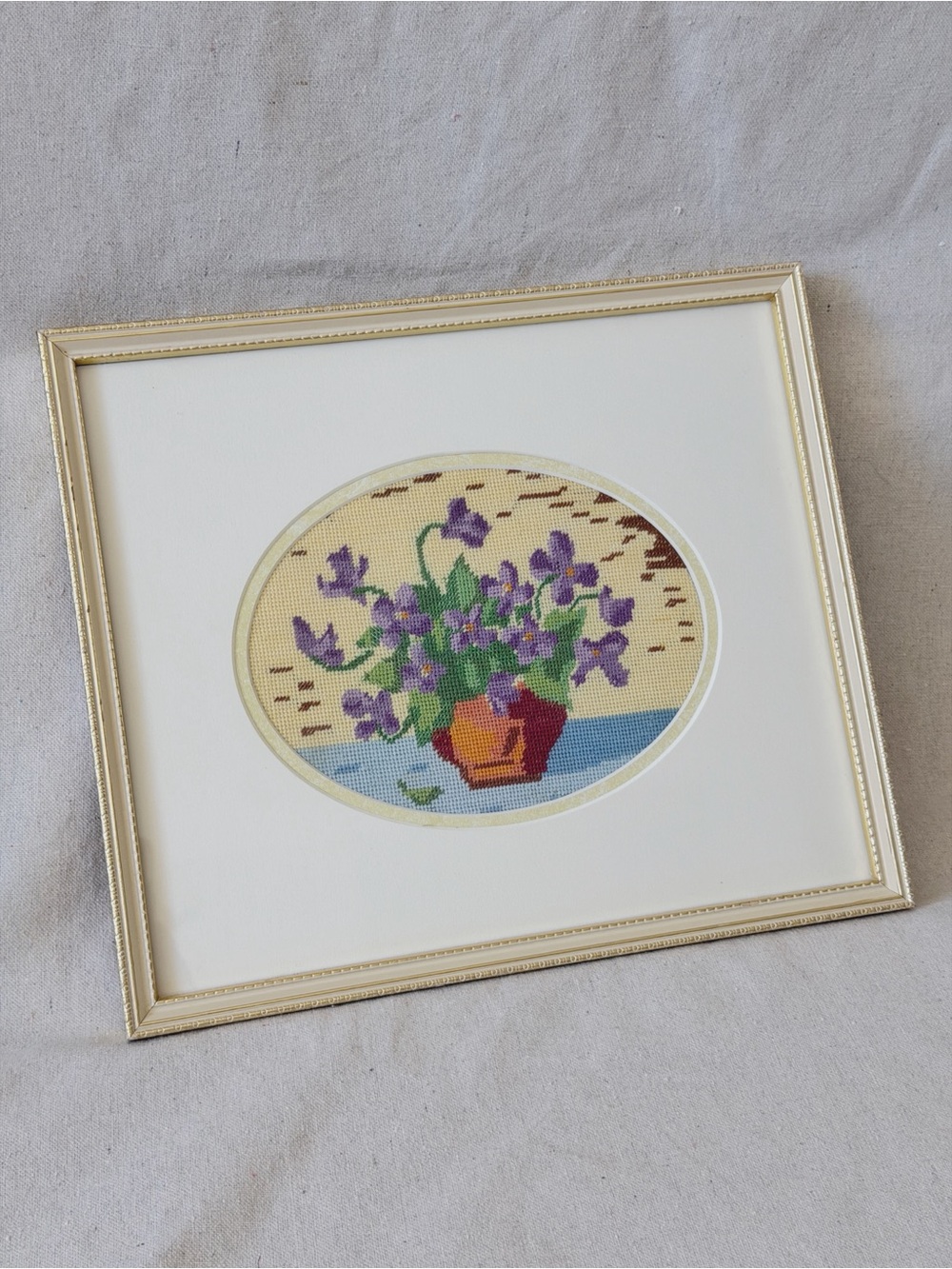 Framed Cross Stitch Floral Violets Artwork in Oval Mat